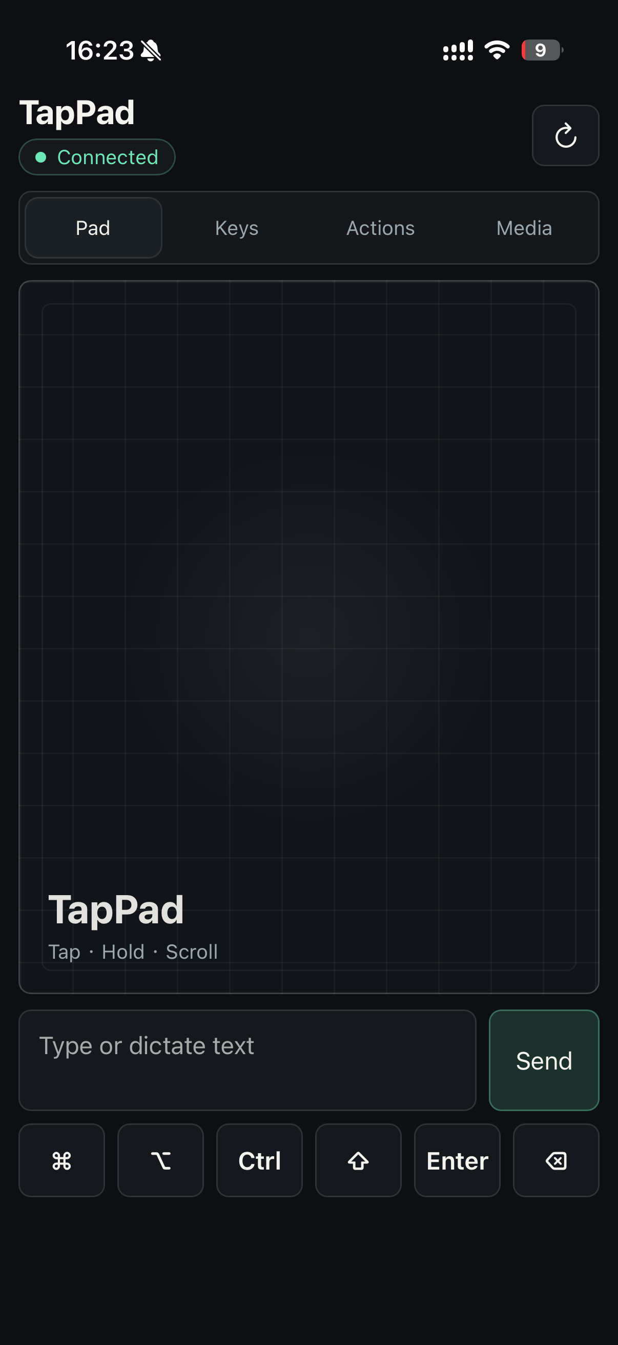 TapPad running on a phone with touchpad, text input, and shortcut keys